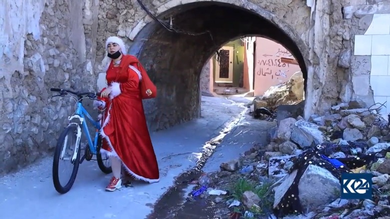 Keçeke Şingalî peyama aştî û pêkvejiyanê li Mûsilê belav dike